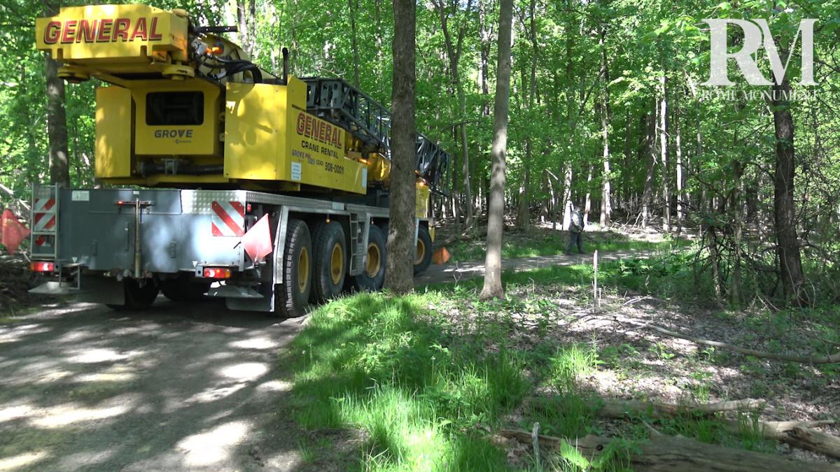 Watch a Mausoleum Crane Truck Ride to the Cemetery