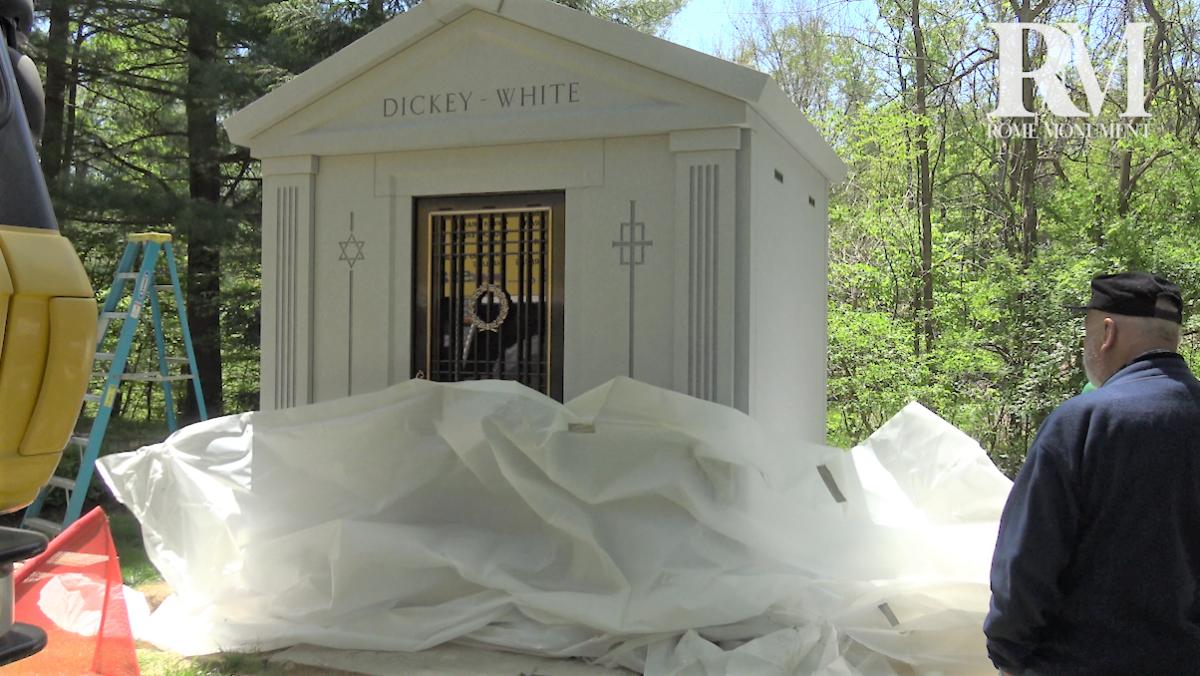 The Protective Tarp Is Removed From The Mausoleum