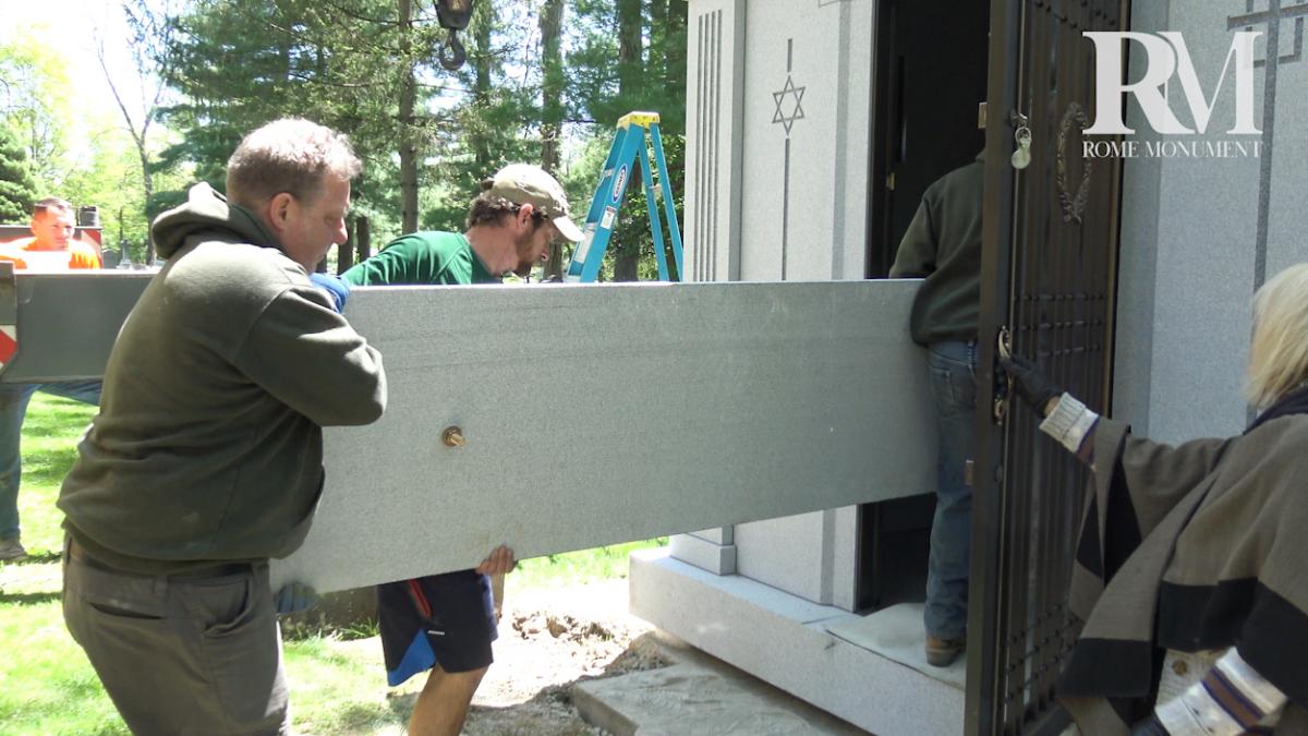 Watch a Granite Crypt Door Placed In The Mausoleum