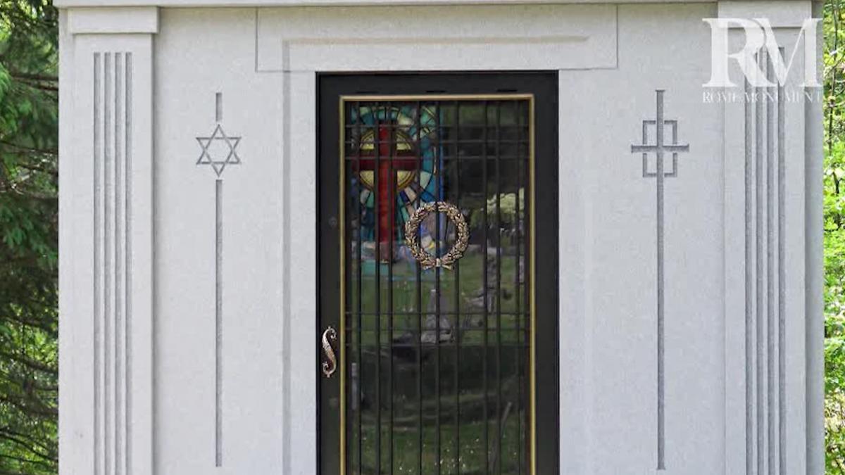 See the Carved Religious Symbols On the Mausoleum